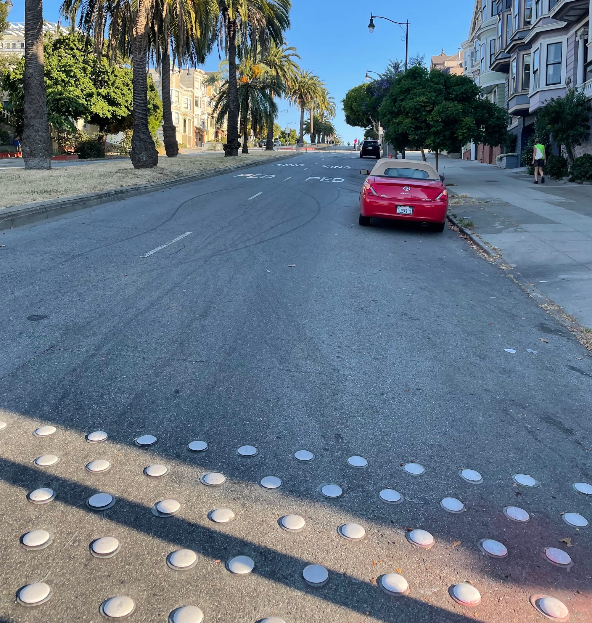 The newly installed Botts' dots on Dolores St. at 20th St. (Photo credit: Safe Street Rebel)